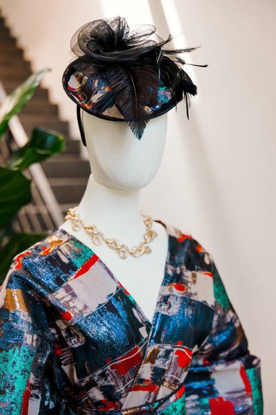 Fascinator in “Regrets”