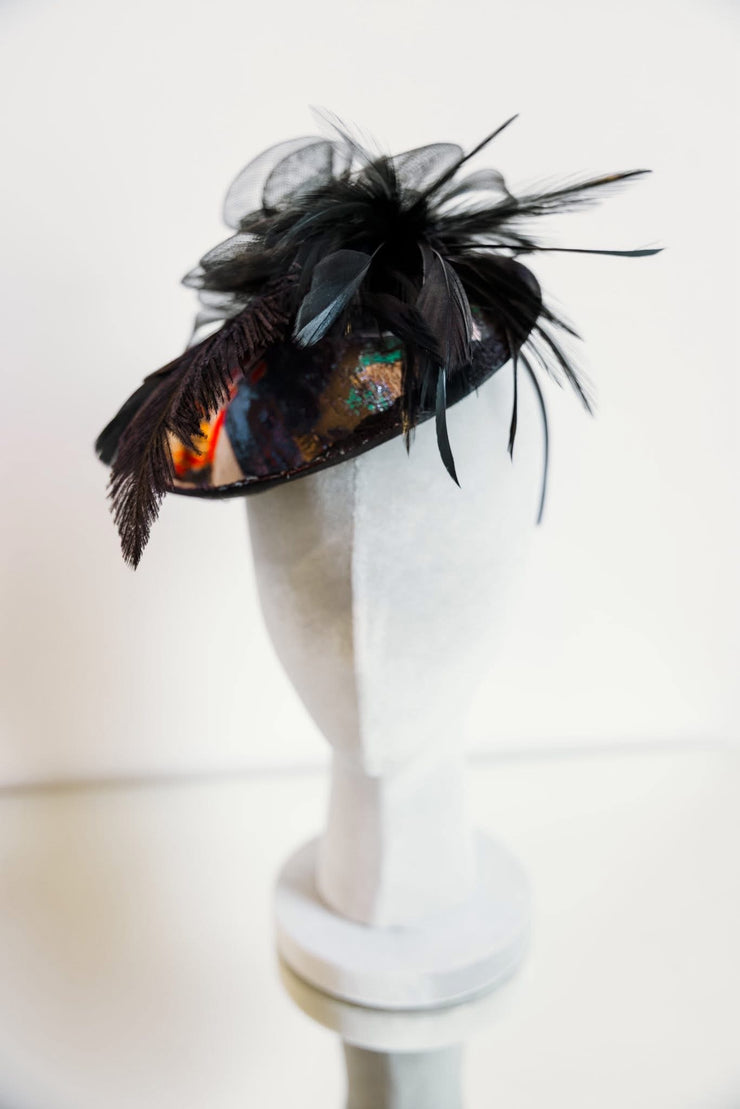 Fascinator in “Regrets”
