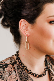 Escape From Paris: Gold Squiggly Oval Hoop Earrings