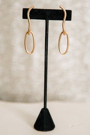 Escape From Paris: Gold Squiggly Oval Hoop Earrings