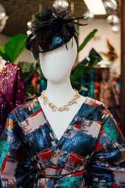 Fascinator in “Regrets”