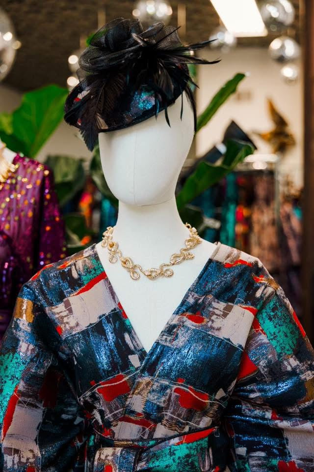 Fascinator in “Regrets”