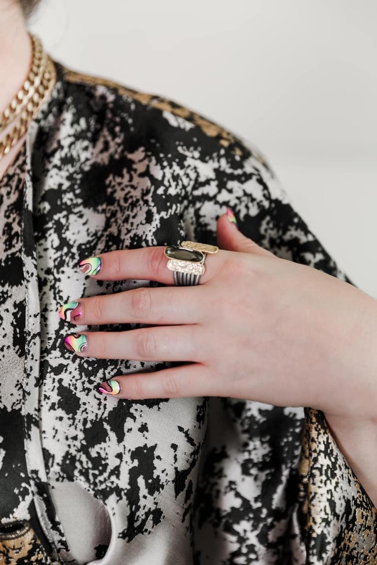 Escape From Paris: Silver Strands Textured Gold Black Diamond Ovals Ring
