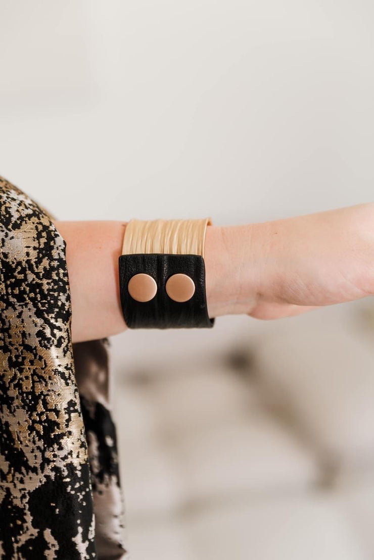 Escape From Paris: Gold Metal Black Leather Large Cuff with Snaps