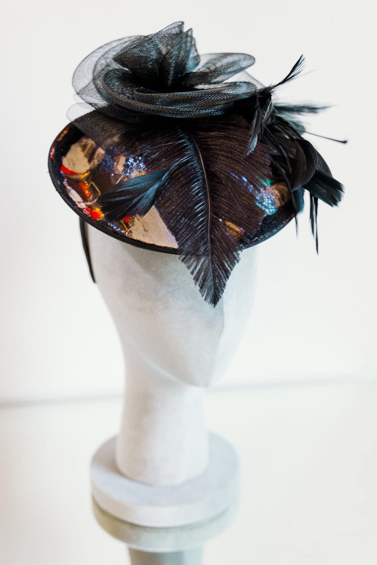 Fascinator in “Regrets”
