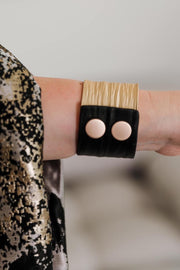 Escape From Paris: Gold Metal Black Leather Large Cuff with Snaps