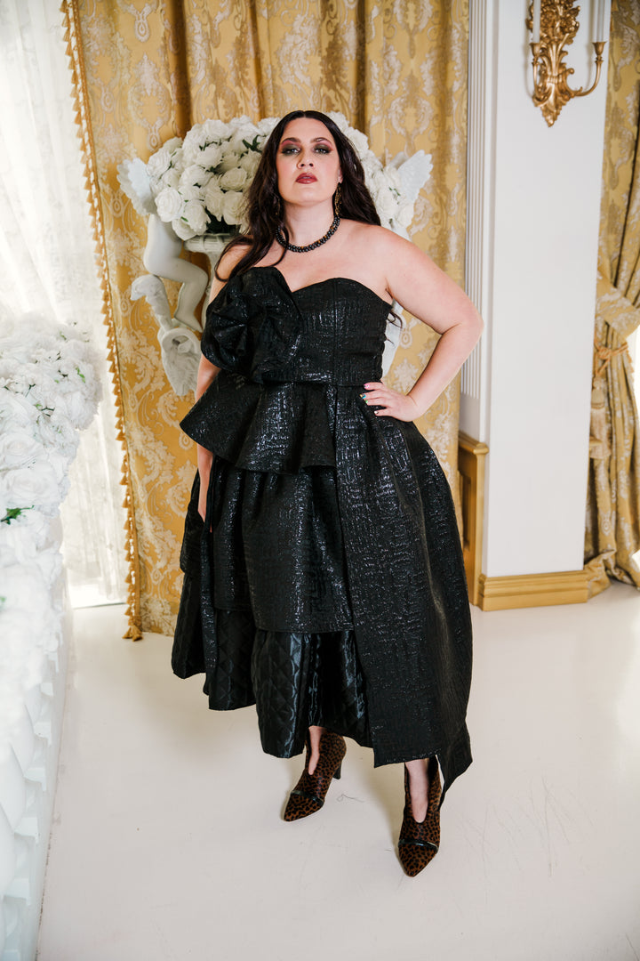 Fleur Peplum Top in “Turandot" (Black)